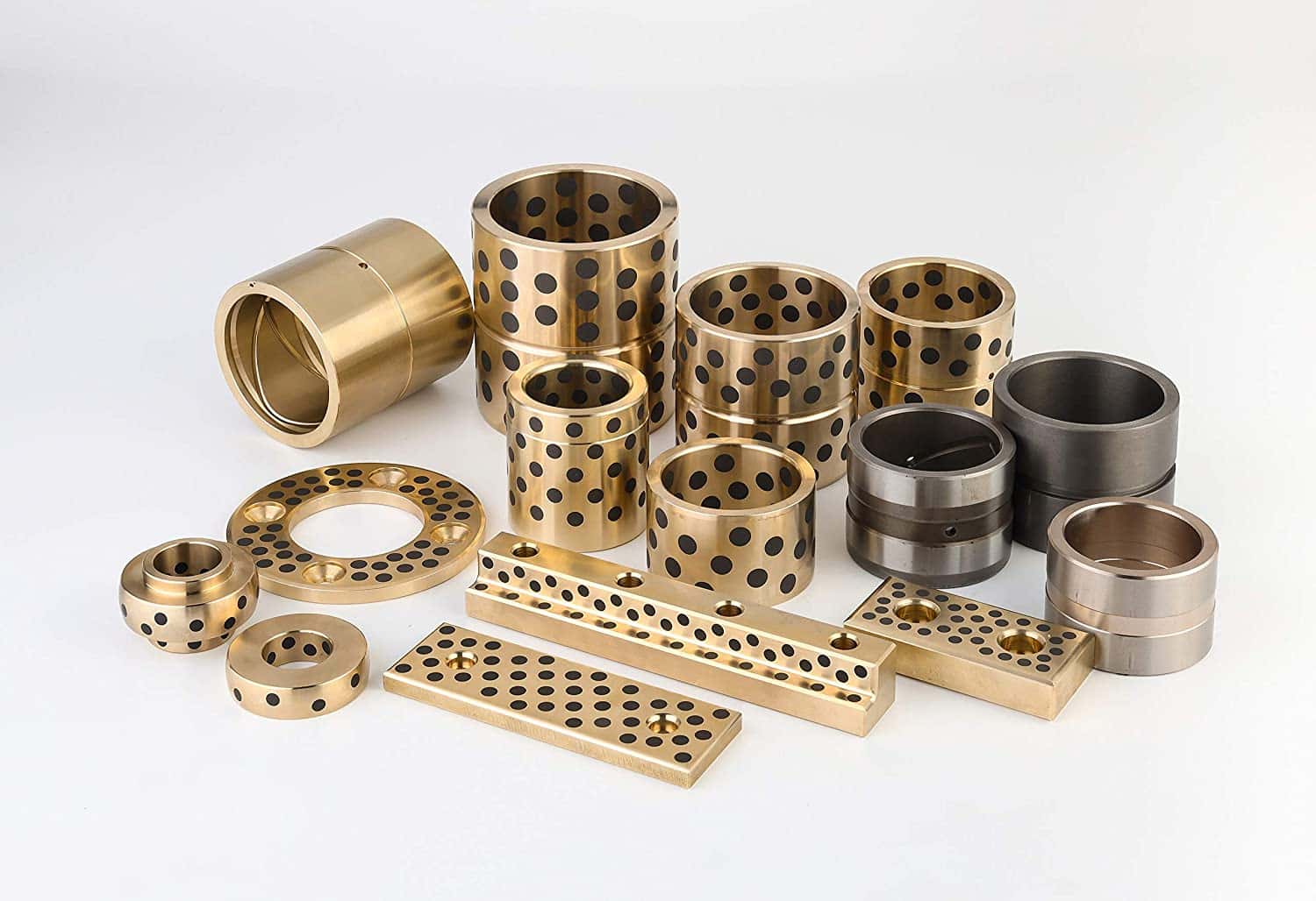 Tribological Property Optimization of Graphite-Bronze Composite Plates and Their Application in Heavy-Duty Bearings